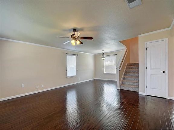 Gorgeous, hand-scraped wood floors that really shine and look very rich!