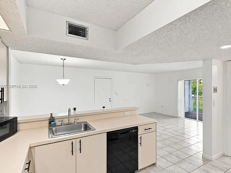 8660 SW 212th St #306 — Photo 13