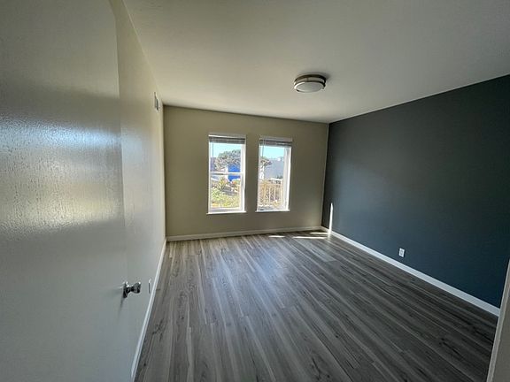 Bedroom. Accent Grey wall may be off white