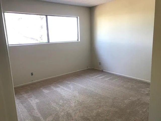 1 of 3 additional bedrooms with large closets.