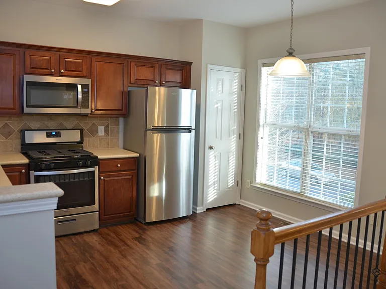 Large Kitchen with Stainless steel appliance and eat in nook and large Pantry