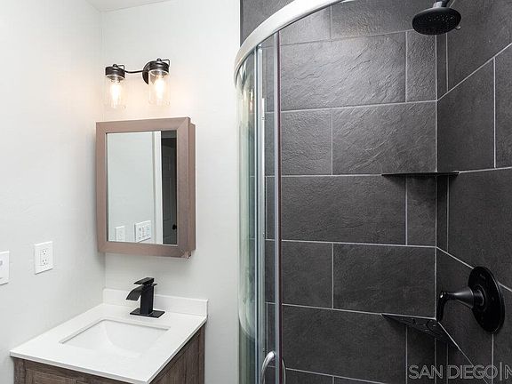 Additional view of bathroom with designer finishes