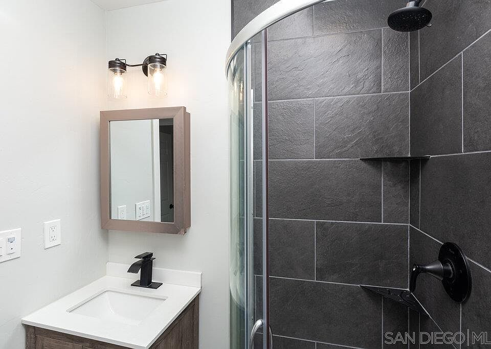 Additional view of bathroom with designer finishes