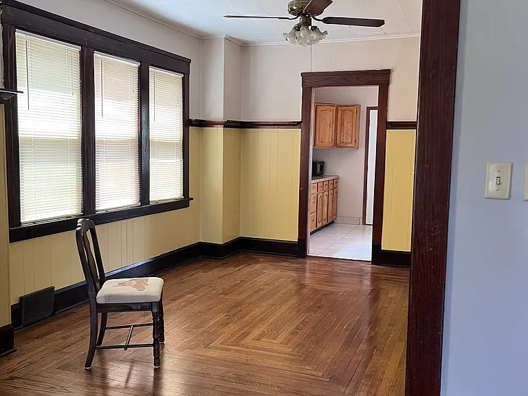 standing in Living Room, seeing into the dinning room and just beyond is the kitchen.