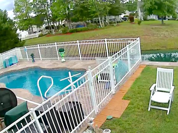 Pool overlooking pond