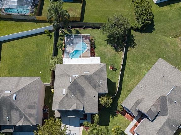 Completely fenced, pie-shaped homesite with Pool facing South!