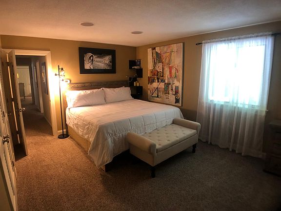 Master bedroom with ensuite bathroom, fireplace and his/her separate closets