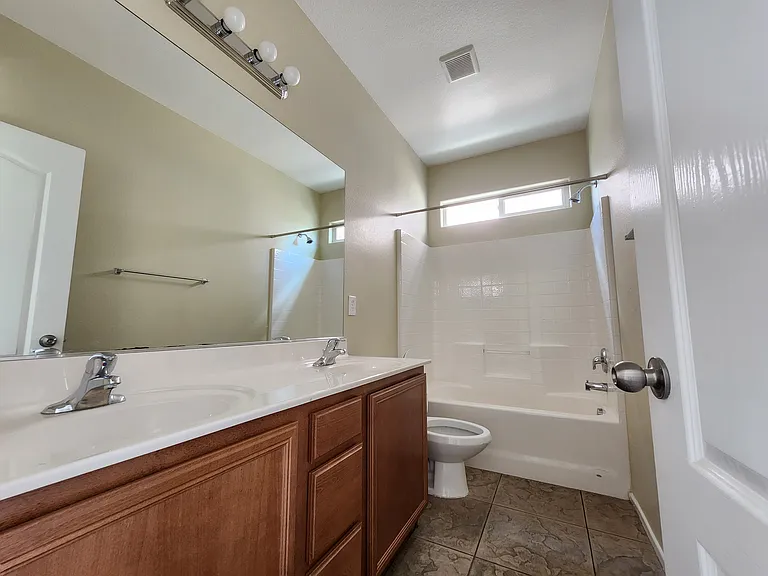 Hallway full bath with dual sinks