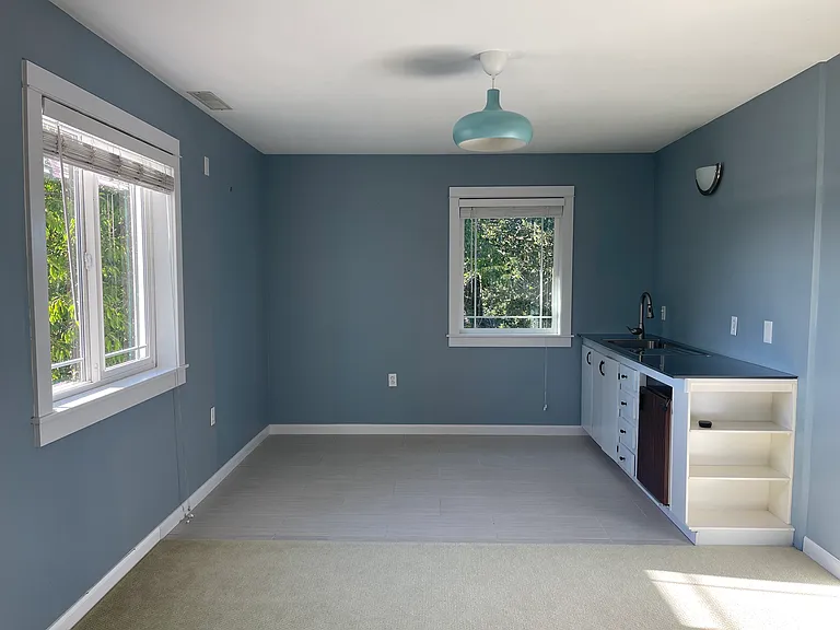 Studio kitchenette with sink and counter space. Full fridge is being delivered today! More cabinets and a few small appliances will also be included. Updated photos coming soon :)