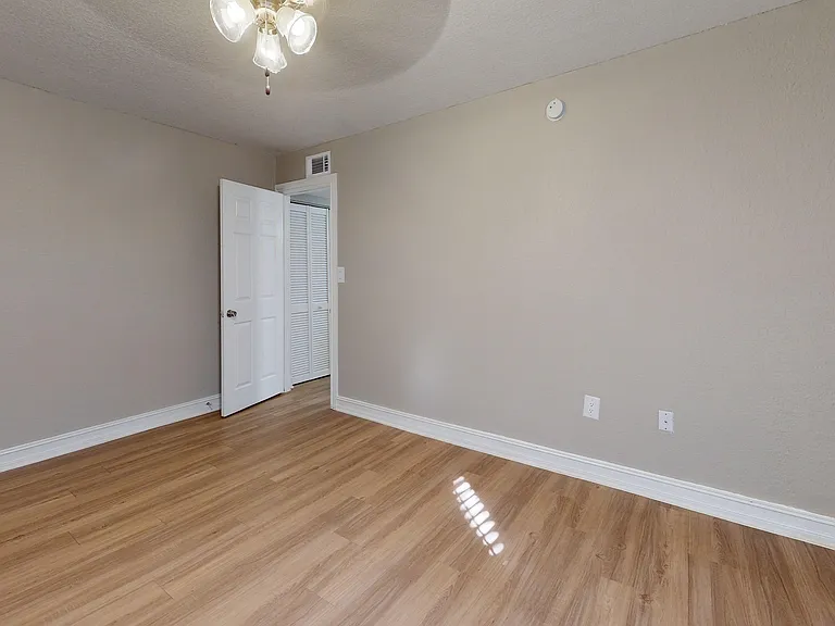 Step into a world of possibilities with this versatile living space, ready for personalization.