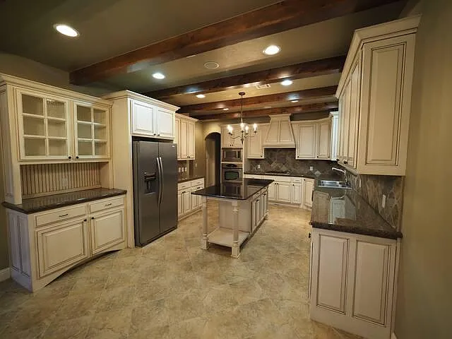 Kitchen if you look at from the diving area. - 4413 Spyglass Dr