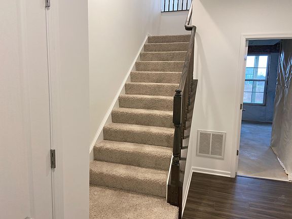 1st floor entrance. Access to garage and s torage room located on this floor in the rear of the property.