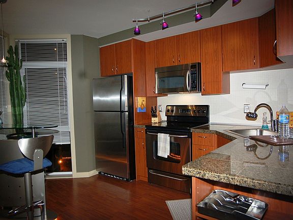 Kitchen with Stainless Steel Appliances and Granite Countertops