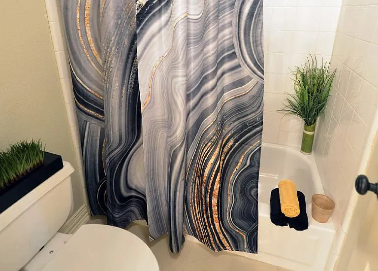 Privacy bath off of the Jack and Jill dressing area
