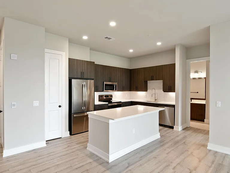 Elevate your everyday with a modern kitchen featuring clean lines, smart design, and contemporary finishes.