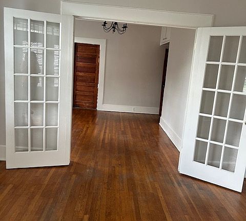 Living room, French doors to dining room