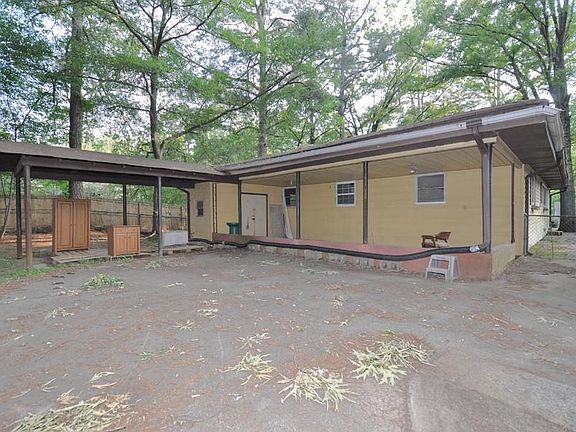 Covered Porch and Car port giving to backyard