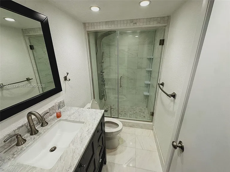 927 NE 199th St #101 — Photo 9