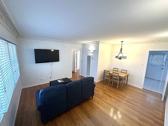 624 D Veteran Avenue, Westwood, CA 90024 - LIVING ROOM Includes Flatscreen TV, Couch, Coffee Table, Dining Table and Chairs