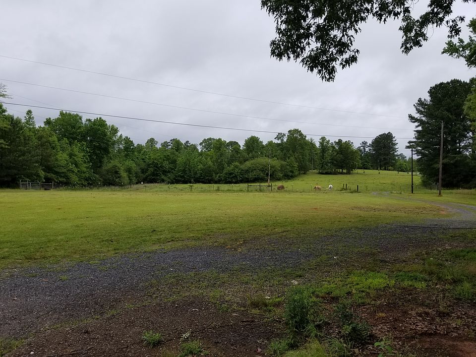 Front Yard & Fenced Pasture