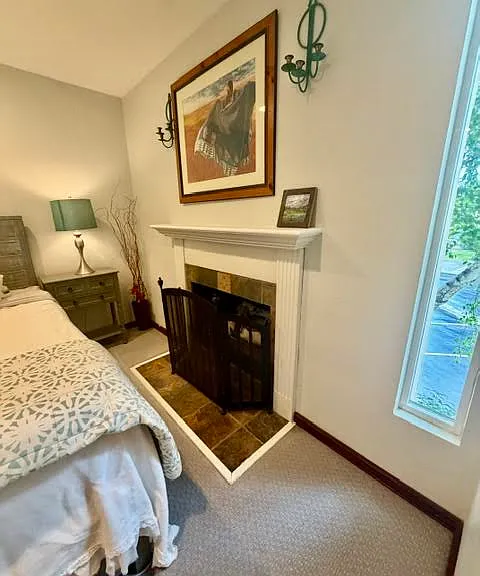 Primary Bedroom Gas Fireplace.