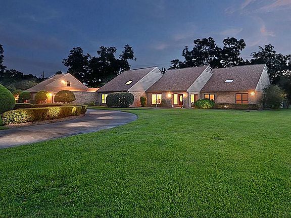 At night, light filters from the windows and accentuates the symmetry in architecture gained by the 