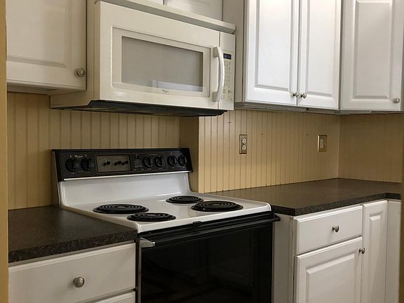 Kitchen cabinetry includes a bank of roomy drawers for more storage!