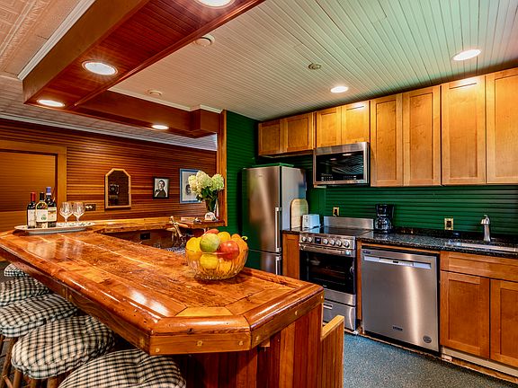 New kitchen with stainless steel appliances - just renovated in 2023. The wooden bar is fabulous and made from the wood on the Carriage House stables for Abraham Lincoln's son!