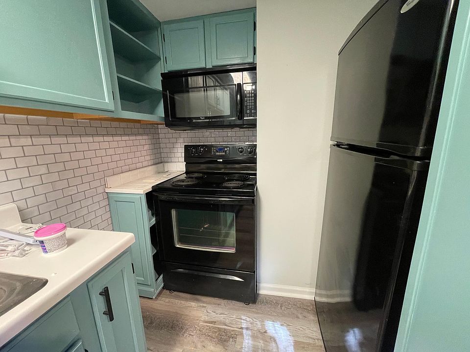 stove with slide out storage