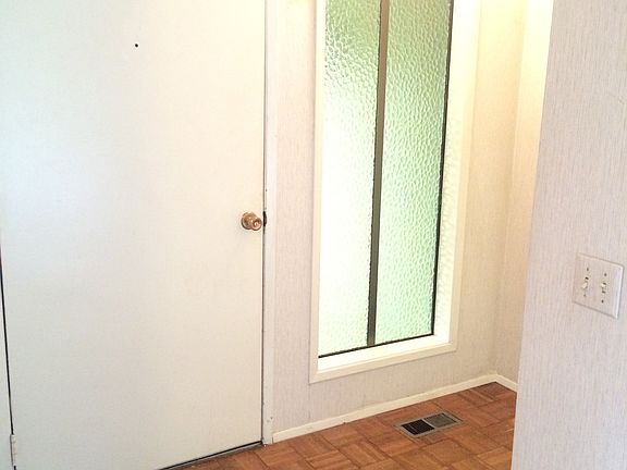 Just inside of front door