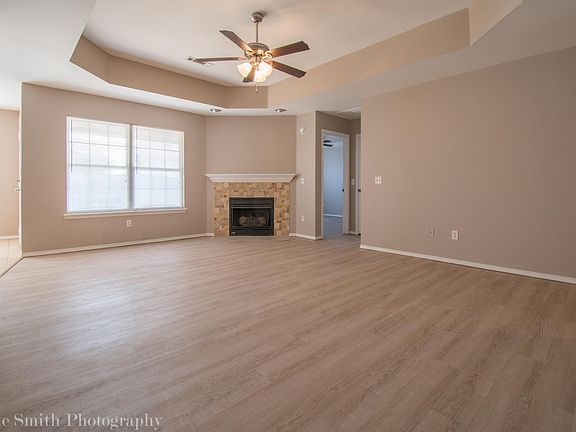 Living Room with vaulted ceiling and Fireplace