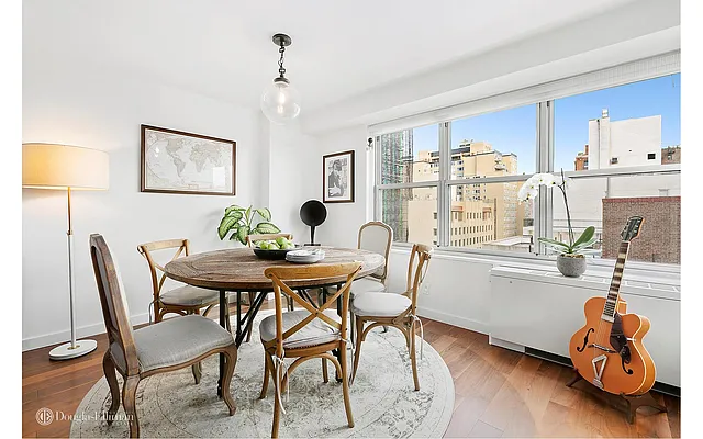 Sold by Douglas Elliman | media 18