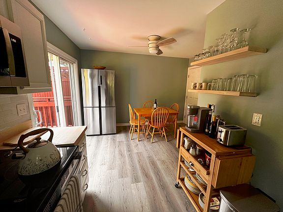 Dining area off kitchen open to living room