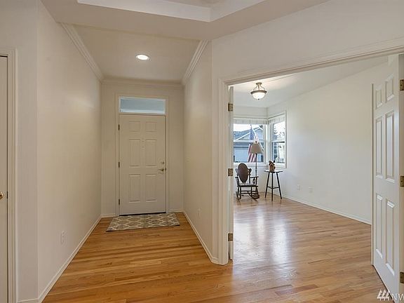 Entry and Den/Office with beautiful Hardwood Flooring.