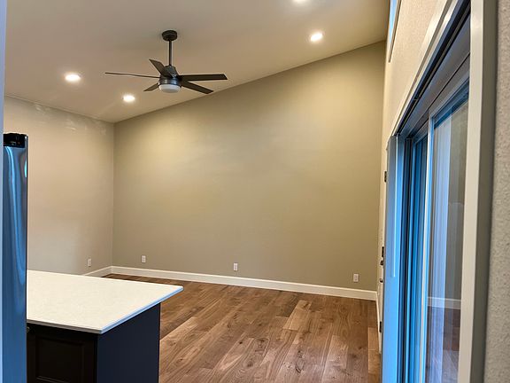 Living room with vaulted ceilings.