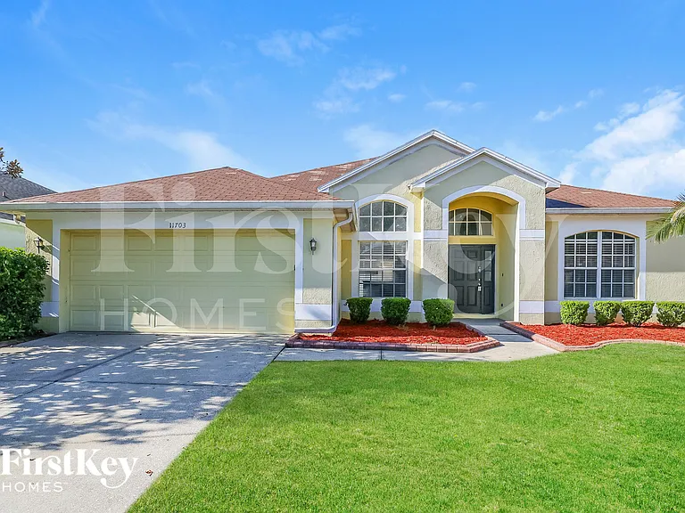 11703 Grove Arcade Dr — Photo 1