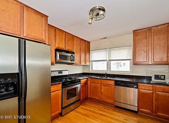5th image of 8031 Kenton Ave APT 1N