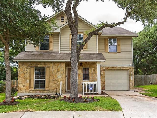 Excellent trees surround this south Austin 2-story.