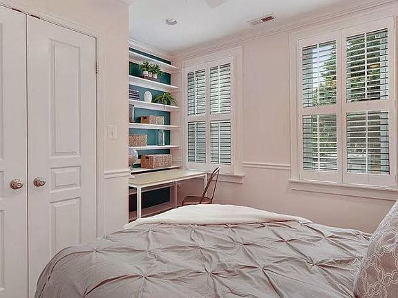 Available room - unfurnished & painted white!