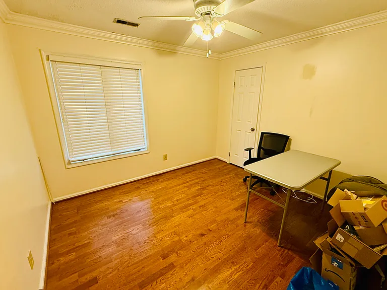 first bedroom on the left (walking down the hallway)