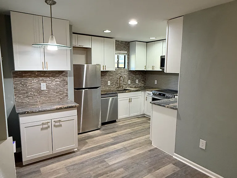 Full kitchen remodel with all stainless steel appliances, new cabinets and countertops done in 2025.