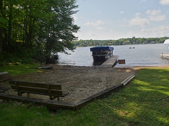 beach
						:
						Natural sandy beach with dock and boat lift