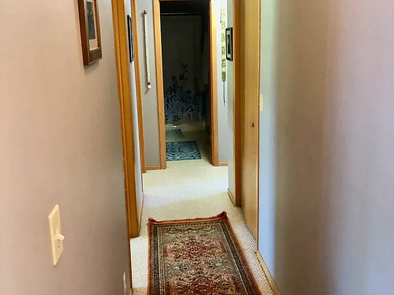 Hall to 4 bedroom and full bath.