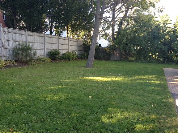 Backyard to be shared by three units.