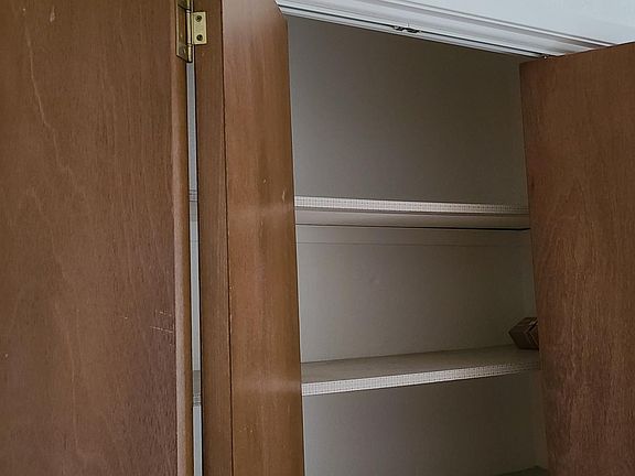 Hall storage for towels, bedding, cleaning supplies and other.