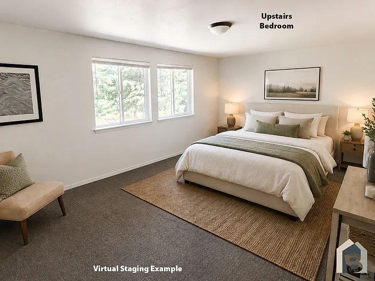 2nd floor large bedroom with view of lawn and mature evergreen trees and double closet