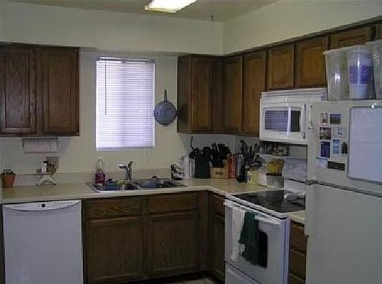 Large kitchen with frig, range, microwave and dishwaher