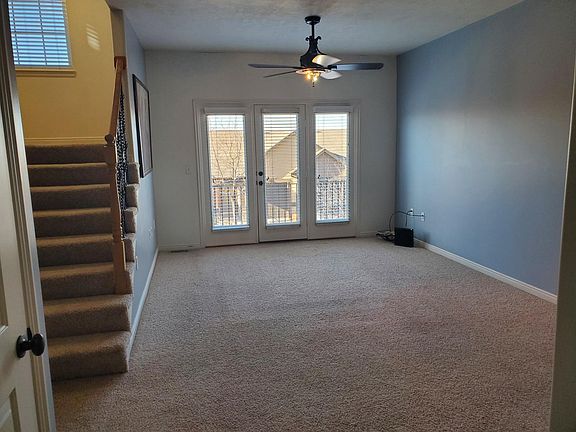 Living room. This view faces the neighborhood.