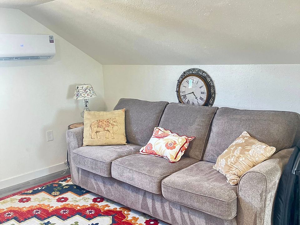 Couch from West Harvard Furniture and updated decor found in the Living Room!