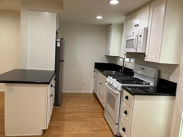 Large pantry on opposite side of French door.
